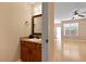 Cozy half bathroom featuring a vanity and decorative mirror at 1825 Brittlebush Ln, Johns Island, SC 29455
