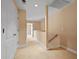 Second story hallway with carpet and neutral walls leading to multiple rooms at 1825 Brittlebush Ln, Johns Island, SC 29455