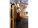 Visible house number with a gate leading to a home shaded by a large tree at 1825 Brittlebush Ln, Johns Island, SC 29455