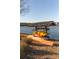 Convenient kayak storage rack near the lake, providing easy access for watersport adventures and outdoor recreation at 1825 Brittlebush Ln, Johns Island, SC 29455