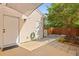 Inviting patio area featuring a privacy fence, storage closet, and a serene outdoor space for relaxing and entertaining at 1825 Brittlebush Ln, Johns Island, SC 29455