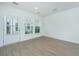 Spacious living room with natural light, neutral paint, and modern flooring at 2005 E Patterson Pt, Hanahan, SC 29410