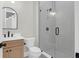Modern bathroom with a glass-enclosed shower, vanity, and neutral wall tones for a clean aesthetic at 202 Countryside Way, Summerville, SC 29483
