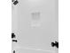 Modern tub and shower featuring white tile and bronze fixtures at 202 Countryside Way, Summerville, SC 29483