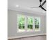Bedroom with natural light from multiple windows and a ceiling fan at 202 Countryside Way, Summerville, SC 29483