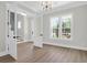 Spacious bedroom offering hardwood floors, large windows, and neutral walls for versatile styling at 202 Countryside Way, Summerville, SC 29483