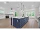Bright, open kitchen featuring a large island, stainless steel appliances and an open floor plan at 202 Countryside Way, Summerville, SC 29483