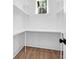 Walk in Pantry with custom shelving for storage and a window with natural light at 202 Countryside Way, Summerville, SC 29483