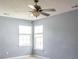 Bedroom features pale blue walls, standard carpeting and bright windows at 206 Trickle Dr, Summerville, SC 29483