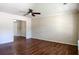 Bright living room featuring hardwood floors, a ceiling fan, and fresh paint at 206 Trickle Dr, Summerville, SC 29483
