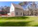 View of a modern two-story house with a well-manicured lawn and mature trees at 2151 River Road, Johns Island, SC 29455
