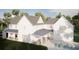 Rear exterior elevation view showcasing a bright and spacious home with an inviting outdoor swimming pool at 2151 River Road, Johns Island, SC 29455
