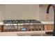 Stainless steel stove with six burners and marble backsplash for a modern kitchen look at 2151 River Road, Johns Island, SC 29455