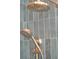 Contemporary shower with green tiled walls and gold shower heads at 2151 River Road, Johns Island, SC 29455