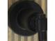 Detail of a modern shower fixture and wood tiled wall at 2151 River Road, Johns Island, SC 29455