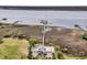 Stunning aerial view of a private dock extending into the water, offering serene waterfront access at 2197 Sandy Point Ln, Mount Pleasant, SC 29466