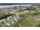 Picturesque aerial view showcasing the community's layout, green spaces, and waterfront location at 2197 Sandy Point Ln, Mount Pleasant, SC 29466