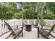 Cozy backyard with a fire pit and Adirondack chairs, perfect for outdoor entertaining at 2197 Sandy Point Ln, Mount Pleasant, SC 29466