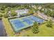 An aerial shot displays the community's amenities, including a playground, swimming pool, and tennis courts at 2197 Sandy Point Ln, Mount Pleasant, SC 29466