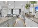 Bright, open kitchen with a large island, granite countertops, stainless steel appliances, and hardwood floors at 2197 Sandy Point Ln, Mount Pleasant, SC 29466