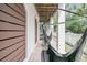 Outdoor patio featuring comfortable hammock chairs and views of the backyard at 2197 Sandy Point Ln, Mount Pleasant, SC 29466