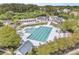 Large community pool with sun loungers, pergolas, and lush landscaping creating a relaxing atmosphere at 2197 Sandy Point Ln, Mount Pleasant, SC 29466