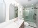 Modern bathroom with glass-enclosed shower, tiled walls, and vanity with sink at 2219 Eagle Dr, North Charleston, SC 29406