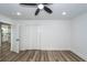 Spacious bedroom with vinyl floors, closet, ceiling fan, and recessed lights at 2219 Eagle Dr, North Charleston, SC 29406