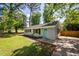 Home with lush lawn, fresh landscaping, and a beautifully updated exterior at 2219 Eagle Dr, North Charleston, SC 29406