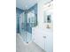 Updated bathroom with a glass shower, marble vanity, and modern fixtures at 2324 High Tide Dr, Charleston, SC 29414