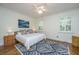 Relaxing bedroom with a king-sized bed and hardwood floors at 2324 High Tide Dr, Charleston, SC 29414
