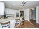 A kitchen with white cabinets, stainless steel appliances, and a granite countertop at 2324 High Tide Dr, Charleston, SC 29414