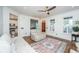 Inviting living room boasts hardwood floors and comfortable seating, leading into the kitchen and dining areas at 2324 High Tide Dr, Charleston, SC 29414