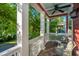 Inviting porch with ceiling fan and cozy chairs perfect for enjoying the outdoors at 2324 High Tide Dr, Charleston, SC 29414