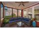 Cozy screened porch with outdoor seating, a ceiling fan, and view to exterior at 2324 High Tide Dr, Charleston, SC 29414