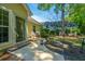 The backyard features a patio, grill, and luscious lawn at 2418 Tuscany Dr, North Charleston, SC 29406