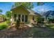 Charming home with a manicured lawn and yellow siding at 2418 Tuscany Dr, North Charleston, SC 29406