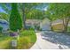 A well maintained home with a lush lawn and tree shaded front yard at 2418 Tuscany Dr, North Charleston, SC 29406