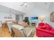 Bright living room featuring a fireplace, entertainment center, and comfortable seating at 2418 Tuscany Dr, North Charleston, SC 29406