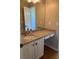 Well-lit bathroom featuring granite countertops, a vanity with storage, and a large mirror at 255 Oak Point Landing Dr, Mount Pleasant, SC 29464