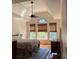 Bright bedroom with hardwood floors, fan, and large windows at 255 Oak Point Landing Dr, Mount Pleasant, SC 29464