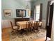 This dining room features traditional furnishings, hardwood floors, and plenty of natural light at 255 Oak Point Landing Dr, Mount Pleasant, SC 29464