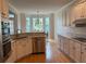 Eat-in kitchen features granite counters, stainless appliances, and hardwood floors at 255 Oak Point Landing Dr, Mount Pleasant, SC 29464