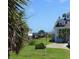 Charming coastal home with well-maintained lawn, and a basketball hoop for outdoor fun at 2604 Palmetto Blvd, Edisto Island, SC 29438