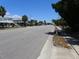 Street view of beautiful coastal neighborhood with tree-lined streets and charming beach homes at 2604 Palmetto Blvd, Edisto Island, SC 29438