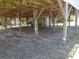 View under the home showing pilings, cross members, and access to outdoor shower/changing area at 2604 Palmetto Blvd, Edisto Island, SC 29438