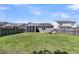 A spacious backyard features a cozy seating area with room to relax and entertain guests at 2809 Conservancy Ln, Charleston, SC 29414