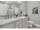 Elegant bathroom features dual sinks, a marble countertop, and modern fixtures for a spa-like experience at 2809 Conservancy Ln, Charleston, SC 29414