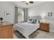 This bedroom features a comfy queen-size bed, soft natural light, and a decorative rug at 2809 Conservancy Ln, Charleston, SC 29414