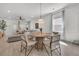 Cozy dining area adjacent to the living room with stylish decor and natural light at 2809 Conservancy Ln, Charleston, SC 29414